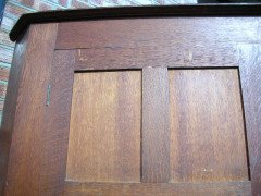 A quality tall Arts & Crafts Oak cupboard with central bevelled mirror - Thumbnail 2