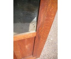 A quality tall Arts & Crafts Oak cupboard with central bevelled mirror - Thumbnail 4