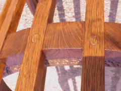 An Arts and Crafts oak tub chair - Thumbnail 8