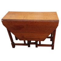 Heal's Attributed, an English Arts & Crafts Oak Drop Leaf Hexagonal Dining Table
