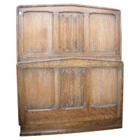 Heal's, an Arts & Crafts Limed Oak Single Bed with Linenfold Carved Details