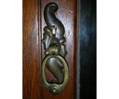 Liberty & Co., an Arts & Crafts Oak Glazed Bookcase with Stylized Heart Details - Thumbnail 10