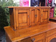 George Walton, Style of. A Small Arts & Crafts Oak Sideboard with Floral Carvings - Thumbnail 4