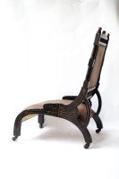 Richard Charles an Aesthetic Movement Ebonised and Parcel Gilt Lounge Chair. - Thumbnail 2