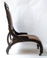 Richard Charles an Aesthetic Movement Ebonised and Parcel Gilt Lounge Chair. - Thumbnail 3