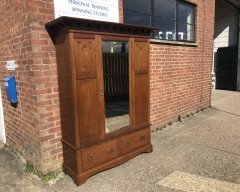 Liberty & Co., an Arts & Crafts Oak Double Wardrobe with Stylised Floral Inlays - Thumbnail 2