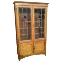 Arts & Crafts Oak Bookcase with Stylised Floral Stain Glass and a Cupboard below - Thumbnail 1