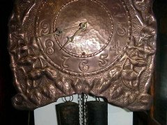 John Pearson, Style of. An Arts & Crafts Copper Wall Clock with Repousse Flowers - Thumbnail 2