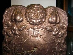 John Pearson, Style of. An Arts & Crafts Copper Wall Clock with Repousse Flowers - Thumbnail 3