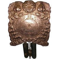 John Pearson, Style of. An Arts & Crafts Copper Wall Clock with Repousse Flowers