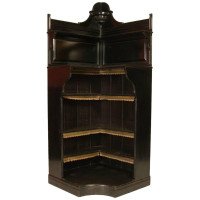 Collinson & Lock Attributed, an Ebonised Open Corner Cabinet