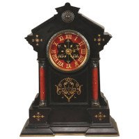 Morris & Co., In the style of, an Aesthetic Movement Gilt Marble Mantle Clock