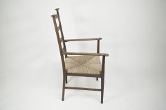 Liberty & Co., Style of C. F. A. Voysey. A Pair of Oak Rush Seat Ladderback Armchairs - Thumbnail 14