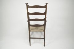 Liberty & Co., Style of C. F. A. Voysey. A Pair of Oak Rush Seat Ladderback Armchairs - Thumbnail 16