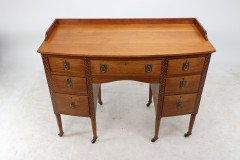 Waring & Gillow. An Arts & Crafts Bow Fronted Kneehole Twin Pedestal Desk - Thumbnail 12