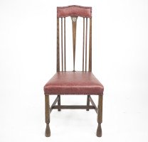 Liberty & Co. Attributed, an Arts & Crafts Oak Chair with Shaped Padded Headrest & Pewter Heart Inlay