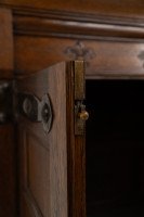 Arts & Crafts Oak Linen Press by Liberty & Co. with Fleur De Lys carved details - Thumbnail 16