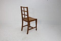 Heals of London, attributed. An Arts & Crafts Oak Lattice Back Side Chair - Thumbnail 14