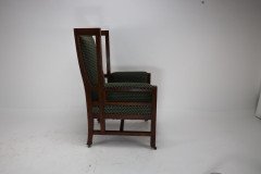 Liberty & Co. Attributed, In the style of Leonard Wyburd. Arts & Crafts Oak wing back Armchair - Thumbnail 5
