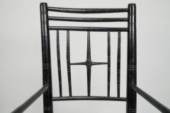 Liberty & Co. An Argyle Aesthetic Movement Ebonised rush seat child's high chair - Thumbnail 7