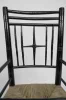 Liberty & Co. An Argyle Aesthetic Movement Ebonised rush seat child's high chair - Thumbnail 6