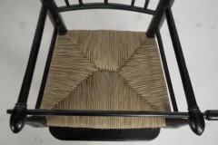 Liberty & Co. An Argyle Aesthetic Movement Ebonised rush seat child's high chair - Thumbnail 9