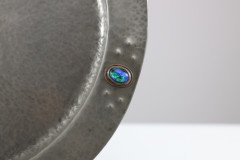 Liberty and Co (attributed). An Arts & Crafts hand hammered pewter plate with five blue enamel jewels - Thumbnail 6