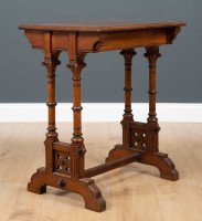 Charles Bevan for Marsh and Jones of Leeds. A Gothic Revival walnut side table with a burr walnut top - Thumbnail 2