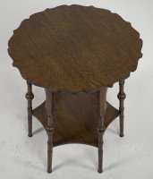 Liberty and Co. An Arts and Crafts oak side or occasional table with a shaped top and molded edges - Thumbnail 3