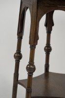 Liberty and Co. An Arts and Crafts oak side or occasional table with a shaped top and molded edges - Thumbnail 4