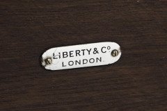 Liberty and Co. An Arts and Crafts oak side or occasional table with a shaped top and molded edges - Thumbnail 13