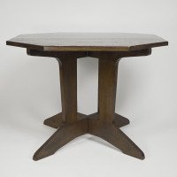 An Arts & Crafts good quality oak octagonal centre table with curved supports - Thumbnail 1