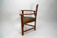 M H Baillie Scott. An Arts & Crafts Walnut Armchair with stylised floral carving - Thumbnail 4