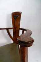M H Baillie Scott. An Arts & Crafts Walnut Armchair with stylised floral carving - Thumbnail 6