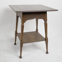 Liberty & Co., attributed. An Arts & Crafts Oak Two-tier Side Table with a Moorish Apron Underneath the Top - Thumbnail 3