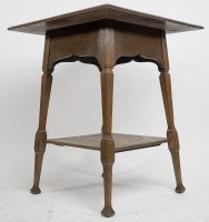 Liberty & Co., attributed. An Arts & Crafts Oak Two-tier Side Table with a Moorish Apron Underneath the Top - Thumbnail 4