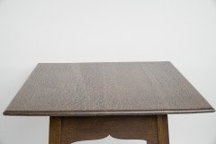 Liberty & Co., attributed. An Arts & Crafts Oak Two-tier Side Table with a Moorish Apron Underneath the Top - Thumbnail 8