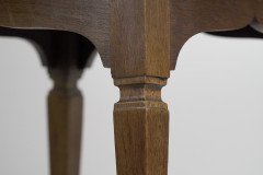 Liberty & Co., attributed. An Arts & Crafts Oak Two-tier Side Table with a Moorish Apron Underneath the Top - Thumbnail 9
