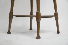 Liberty & Co., attributed. An Arts & Crafts Oak Two-tier Side Table with a Moorish Apron Underneath the Top - Thumbnail 12
