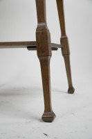 Liberty & Co., attributed. An Arts & Crafts Oak Two-tier Side Table with a Moorish Apron Underneath the Top - Thumbnail 15