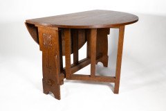 Liberty & Co., an Arts & Crafts 1/4 Salon Oak Drop Leaf Table with Stylised Floral Carved Decoration - Thumbnail 8