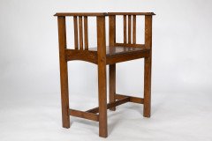An Arts and Crafts oak piano stool with raised sides - Thumbnail 6