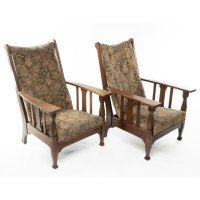 Harris Lebus. A Pair of Arts & Crafts Oak Reclining Armchairs with Large Flat Extended Arms
