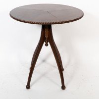 Lambs of Manchester attr. A fine Aesthetic Movement walnut circular wine table - Thumbnail 2