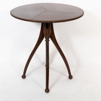 Lambs of Manchester attr. A fine Aesthetic Movement walnut circular wine table - Thumbnail 3