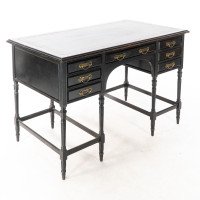 E. W. Godwin for Collinson & Lock. An Aesthetic Movement Ebonised walnut desk