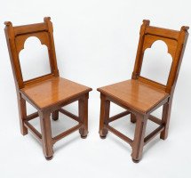 Bruce Talbert Attributed, a Pair of Gothic Revival Walnut Hall Chairs