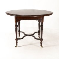 Collinson & Lock, attributed. An Aesthetic Movement Walnut Circular Center Table - Thumbnail 5