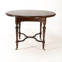 Collinson & Lock, attributed. An Aesthetic Movement Walnut Circular Center Table - Thumbnail 7