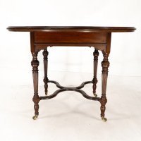 Collinson & Lock, attributed. An Aesthetic Movement Walnut Circular Center Table - Thumbnail 9